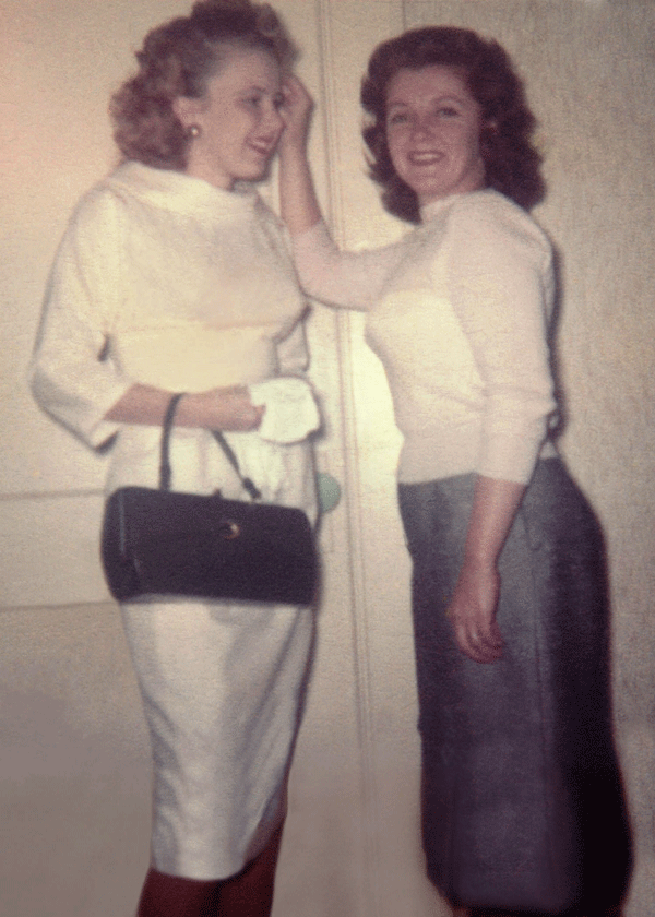 Restored colour photograph of two women